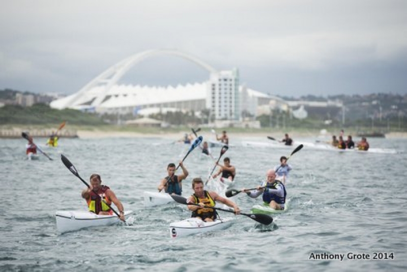 Australia&#039;s James Morfitt (right) leads Billy Harker (left) and a group of local paddlers back from their leg down towards the iconic Moses Mabhida stadium