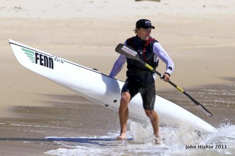 Jasper Mocke sprints up the beach to beat brother Dawid who took the long option paddling into the wind
